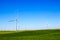 Fields With Three Bladed Energy Producing Windmills