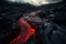 The Fierce Beauty of a Volcanic Wonderland Majestic View of Red-Hot Lava Flowing Through Black Rocks