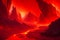 A fiery landscape of molten rock, with jagged cracks and fissures generated by Ai