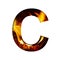 Fiery letter C from white paper on a background of fire in a fireplace or stove, decorative alphabet