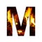 Fiery letter M from white paper on a background of fire in a fireplace or stove, decorative alphabet