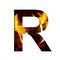 Fiery letter R from white paper on a background of fire in a fireplace or stove, decorative alphabet