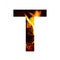 Fiery letter T from white paper on a background of fire in a fireplace or stove, decorative alphabet