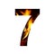 Fiery number seven, 7 from white paper on a background of fire in a fireplace or stove, decorative alphabet