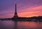 Fiery sunrise on the Eiffel Tower and Seine River, Paris