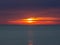 Fiery sunrise at the sea. Summer season. Emilia Romagna region. Adriatic sea. Italy