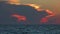 Fiery sunset clouds over the gulf of Mexico loop