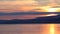 Fiery sunset on lake Baikal in winter
