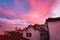 Fiery Sunset Over Alfama Rooftops Historic Area Lisbon Portugal