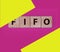 FIFO First in, first out word on wooden cubes on blue. Accounting Concept