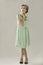 Fifties woman in green dress