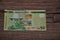 A fifty dollar Namibia banknote on a wooden background