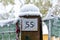 Fifty Five - House Number with snow