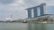 Fifty-five storeys high marina bay sands hotel dominates the skyline at Marina Bay in Singapore timelapse hyperlapse.
