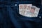 Fifty reais notes in jeans pocket