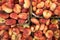 Fig peach, flat peaches at farmer`s market or grocery shelves. Top view, background for agriculture news or illustration