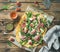 Fig, prosciutto, arugula and sage flatbread pizza with rose wine