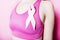 Fight for Breast Cancer woman with symbol on pink background