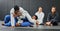 Fight, karate class and martial arts teamwork in competition, challenge or self defense sport in wellness school