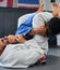 Fight, karate and martial arts teamwork in competition, challenge or combat sport in wellness studio. Sports trainer or