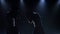 Fight of two boxers in studio on a dark background