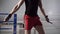 Fighter man jumping on skipping rope at box ring. Athlete man training on jump exercise on skipping rope in gym. Cardio