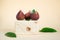 Figs close-up on a pastel background on a wooden cube. Modern kitchen trends. The concept of proper nutrition,vegetarian diet