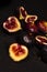 figs on a dark wood background. tinting. selective focus on the front figs slice in the bowl