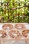 Figs drying process on plates on the table on the balcony