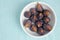 Figs fruits in a bowl, top view