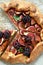 Figs galette with fresh figs. Traditional rustic fruit homemade pie, top view.