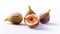 Figs: a tantalizing display of half and whole fruits, glistening with freshness