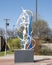 Figurative steel sculpture by Joshua Weiner on 15th Street in Plano, Texas.