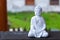 Figure of Buddha on blurred background. Meditation concept