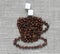 The figure of the Cup is lined with grains of roasted coffee wit