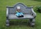 Figure of an English bulldog with water bowl for dogs arranged on a bench
