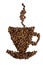 A figure in the form of a cup with a saucer and a couple above it is laid out from coffee beans on a white background
