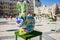 The figure of funny colored Easter bunny with big eyes and nose with painted cats on body. Beautiful Easter decoration art. Kyiv K