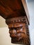 Figure head lion carved in wood in the corner