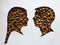 figure of a male and female human faces of profile with roasted coffee beans and white background