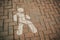 Figure of a man on the asphalt footpath surface pedestrian