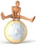 Figure, man jumping over euro coin