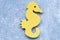 Figure of a seahorse on a light background