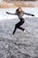 Figure skating woman at the frozen lake