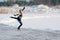 Figure skating woman at the frozen lake