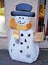 Figure of snowman in front of a Christmas gifts shop, Germany