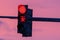 Figures at a red traffic light on a background