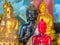 Figures of the sitting Buddha in the Wat Saket Temple or Golden mount, Bangkok, Thailand