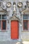 Figures on the walls of the Basilica of the holy blood and the Red Door