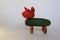 Figurine of a fantastic animal made from tomato and cucumber